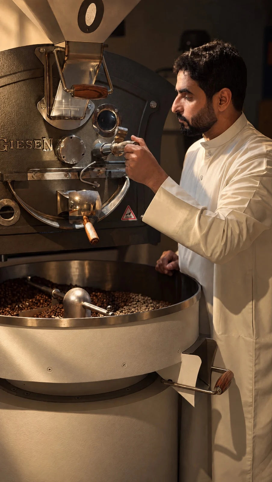 Sarhan Al Karbi at the controls, drawing a sample from the trier.